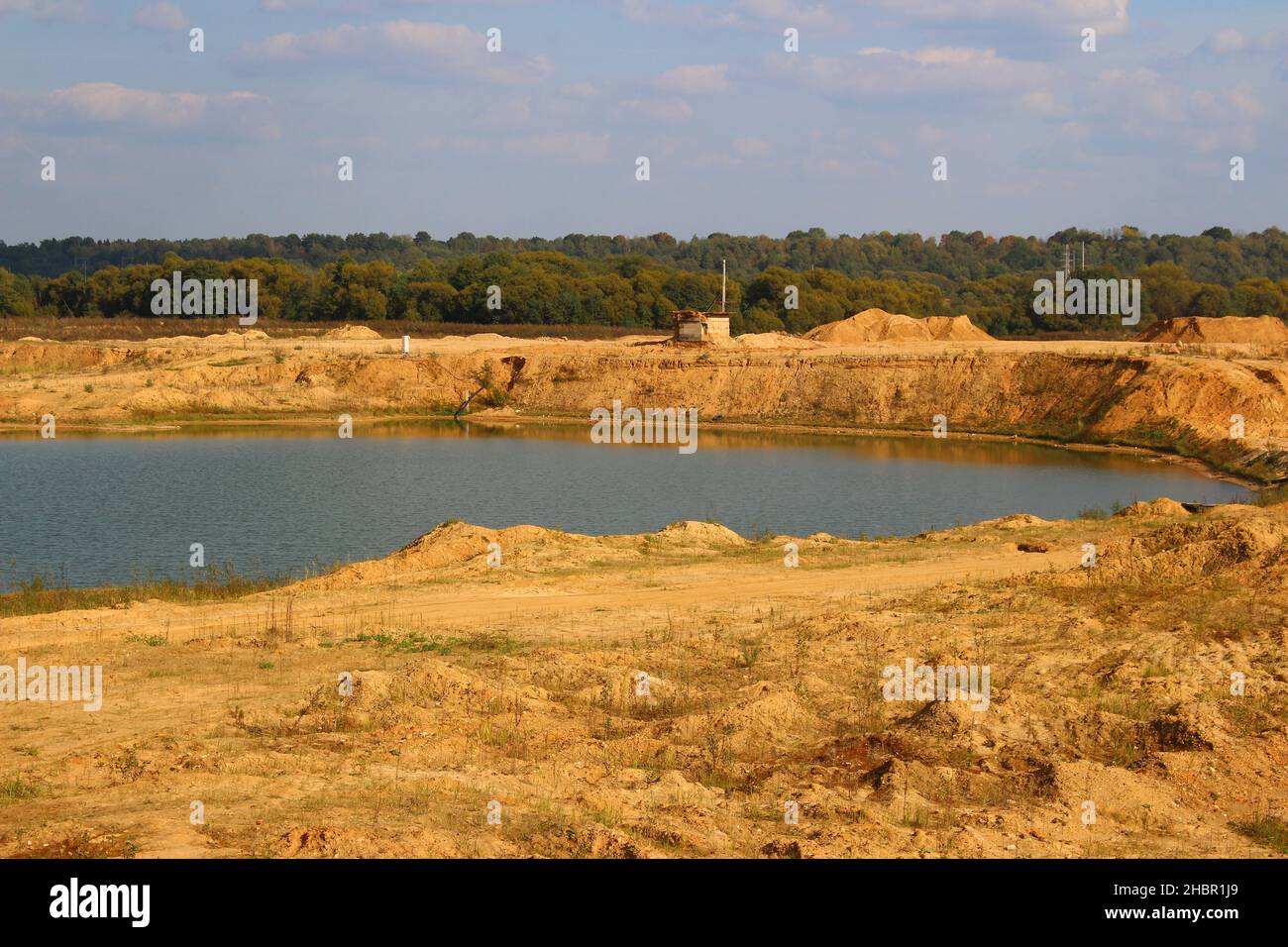 View of the sand and gravel pit, part of the quarry is flooded with water. Maloyaroslavets, Russia Stock Photo