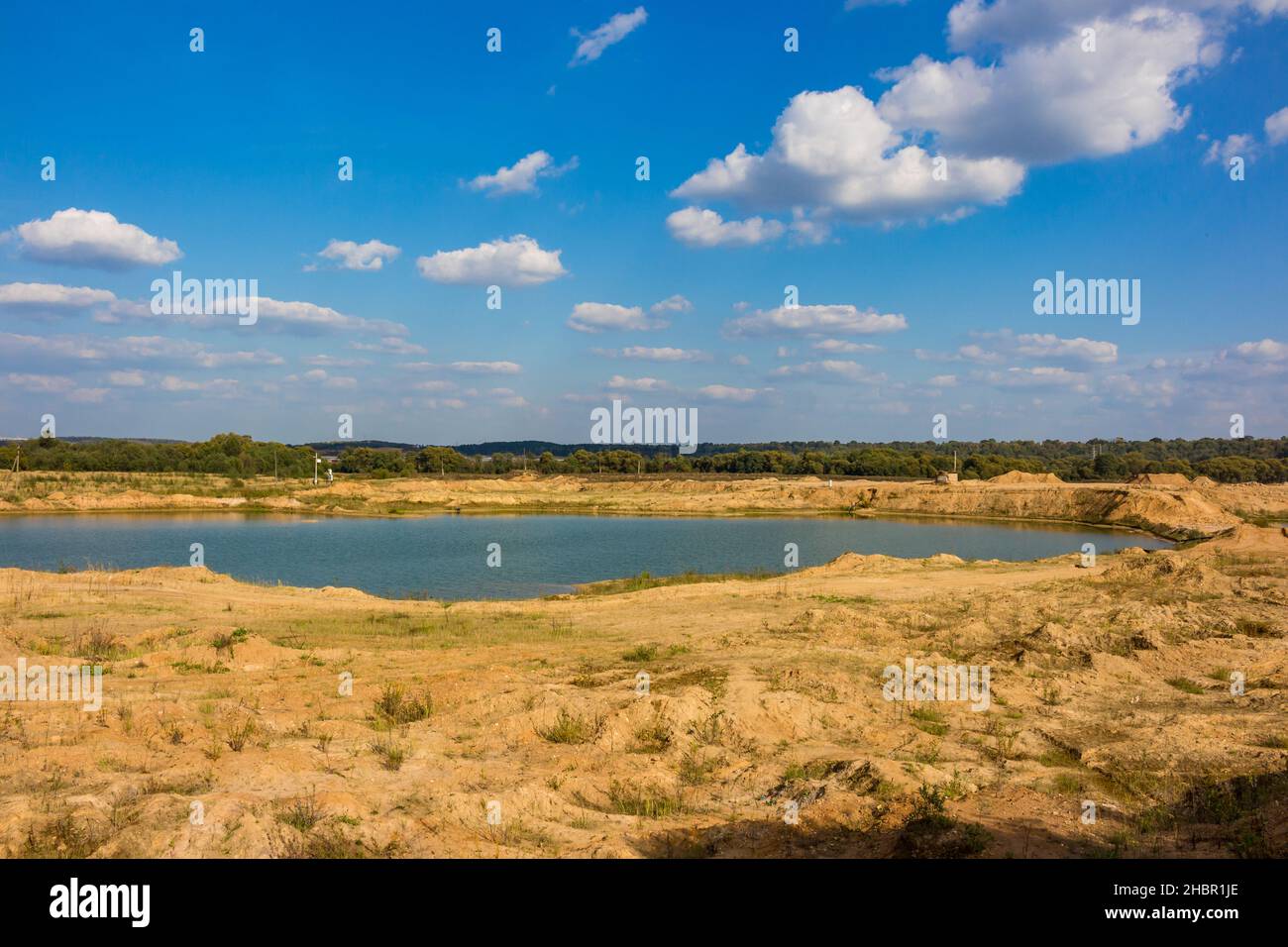 View of the sand and gravel pit, part of the quarry is flooded with water. Maloyaroslavets, Russia Stock Photo