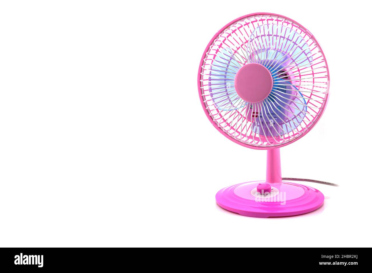 Pink electric table fan isolated on white background Stock Photo - Alamy