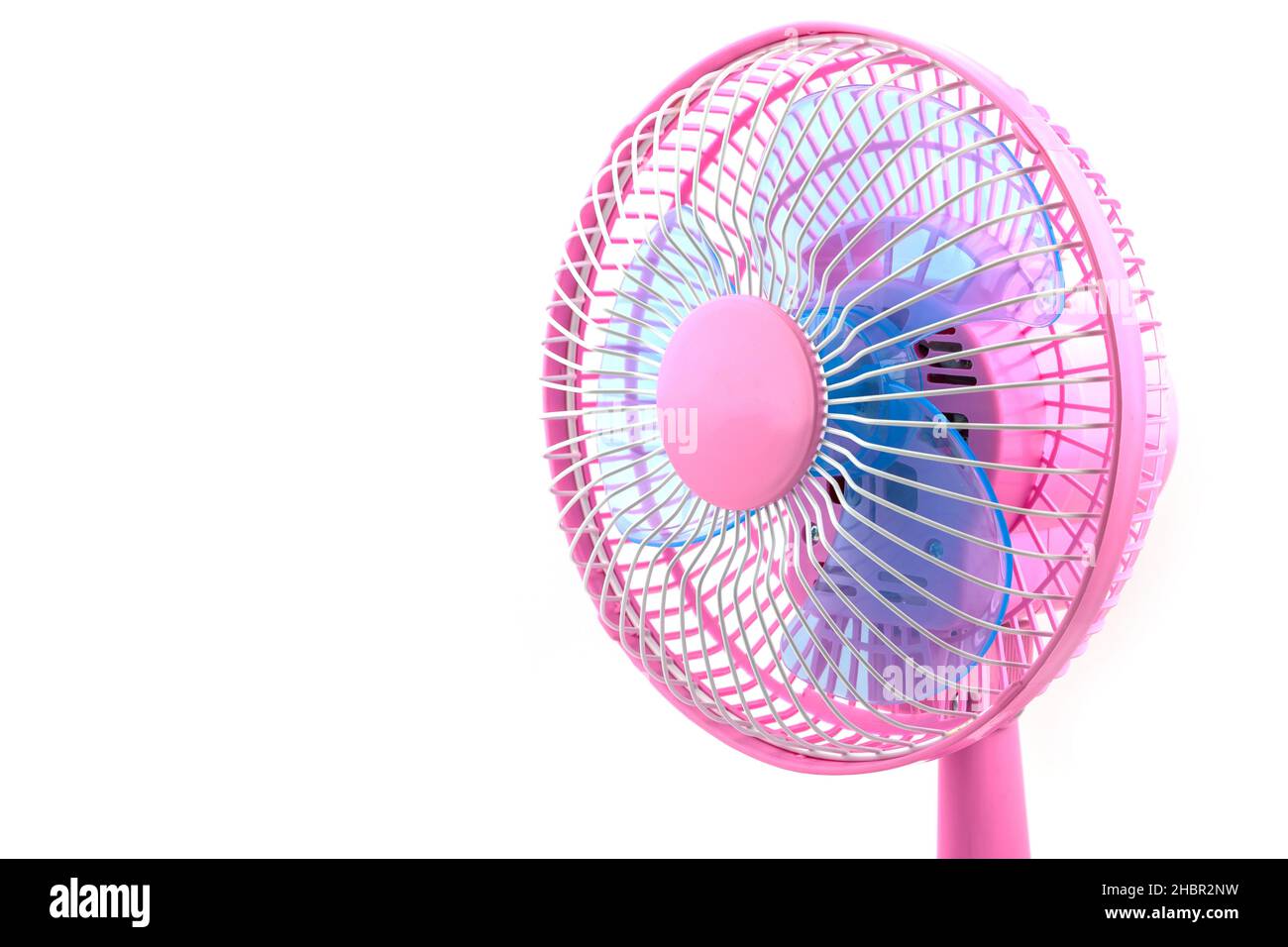 Pink electric table fan isolated on white background Stock Photo - Alamy