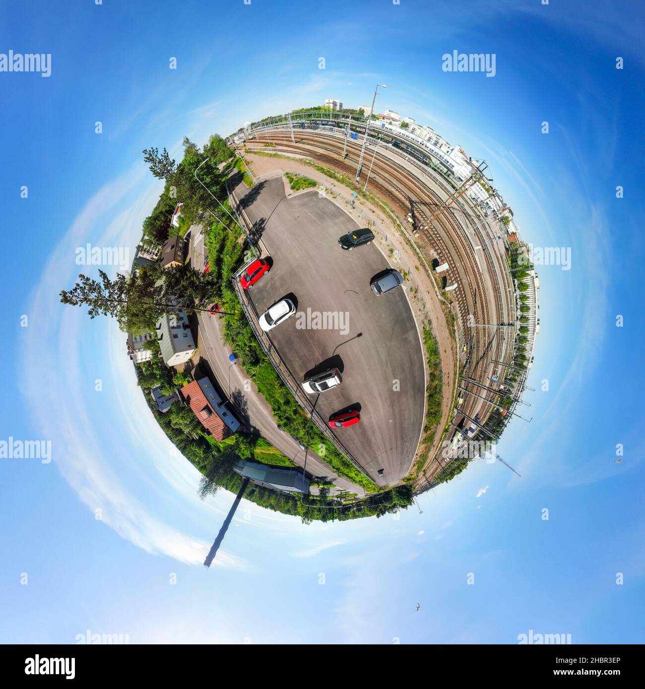 A three dimensional aerial panoramic view of Kouvola railway station, car parking and city center. Stock Photo