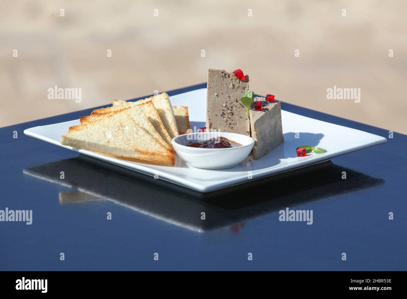 Decorated plate of liver pate with toast Stock Photo