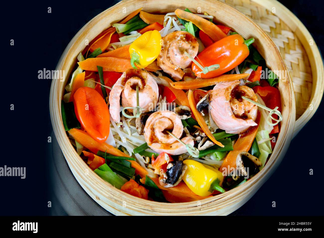 Steamed Salmon with vegetables in bamboo steamer Stock Photo Alamy