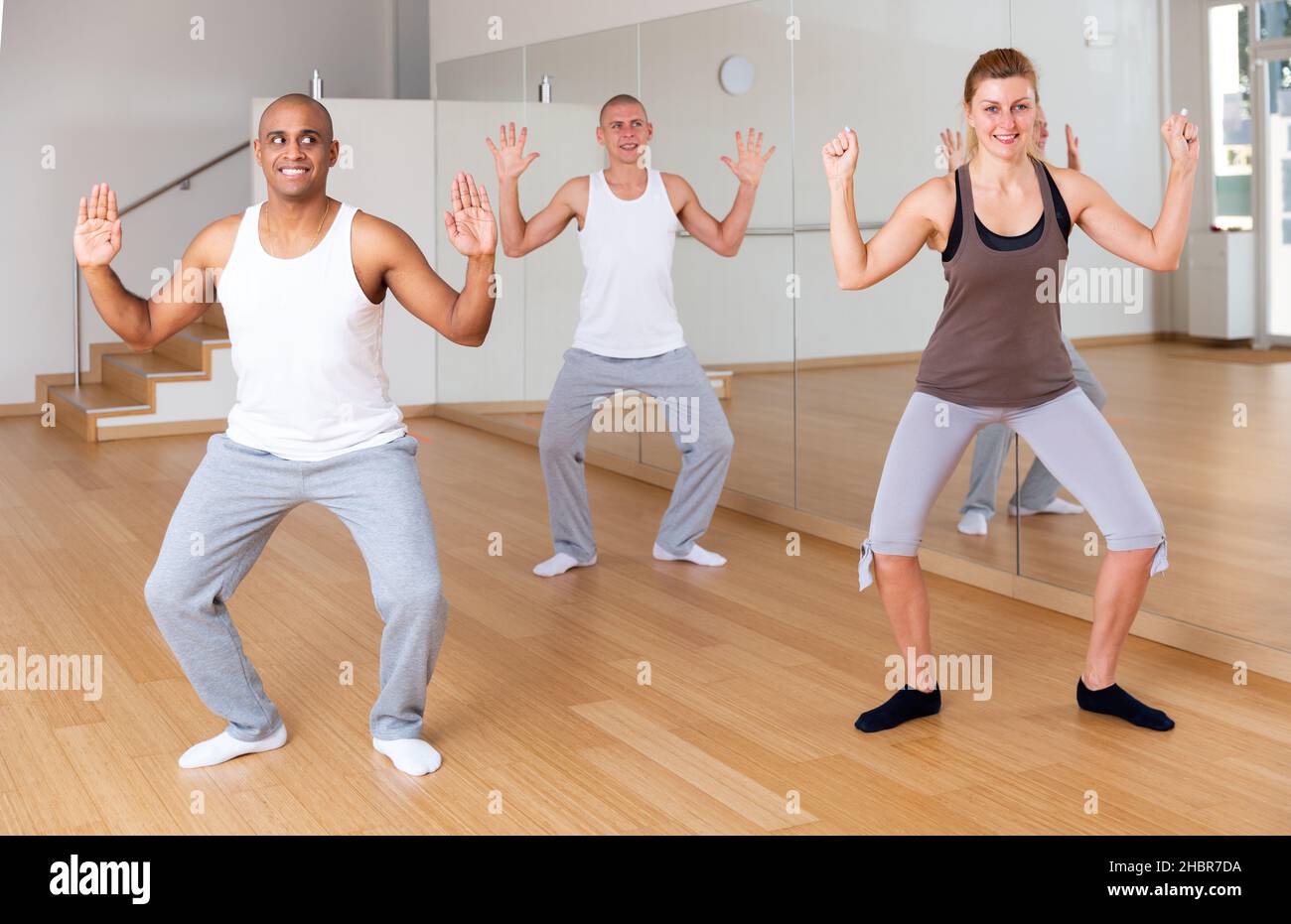 Group of multinational activity people practicing dance techniques Stock Photo