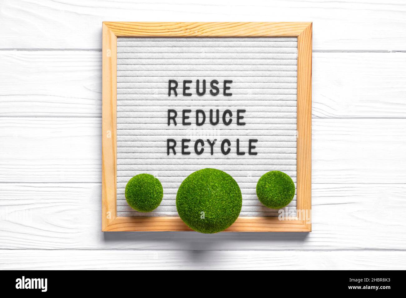 elt board with quote text Reuse, Reduce, Recycle on white wooden table ...