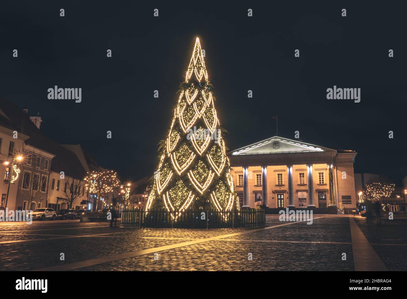 Vilnius, Lithuania - December 17th, 2021: Christmas tree in Town Hall  square at night Stock Photo