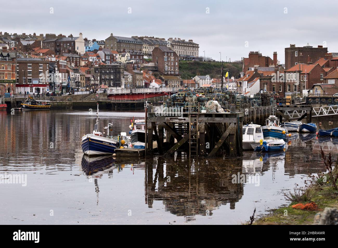 The harbour, Whitby, North Yorkshire, UK, with fishing, pleasure and other boats moored at the quayside. Stock Photo