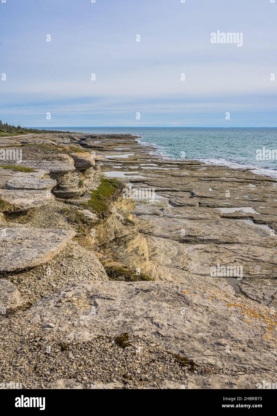 the rugged shoreline of the St Lawrence estuary, with rocky formations