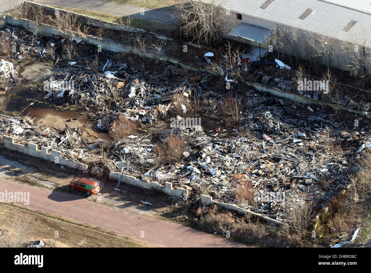 Mayfield, KY, USA. 20th Dec, 2021. Aerial view of damages in Mayfield, Kentucky, after rare December tornadoes ripped through Kentucky, resulting in the deaths of 78 people. Governor Beshar said, during a press conference, that there are no active search and rescue operations taking place in the state. December 20, 2021. Credit: Mpi34/Media Punch Credit: Media Punch Inc/Alamy Live News/Alamy Live News Stock Photo