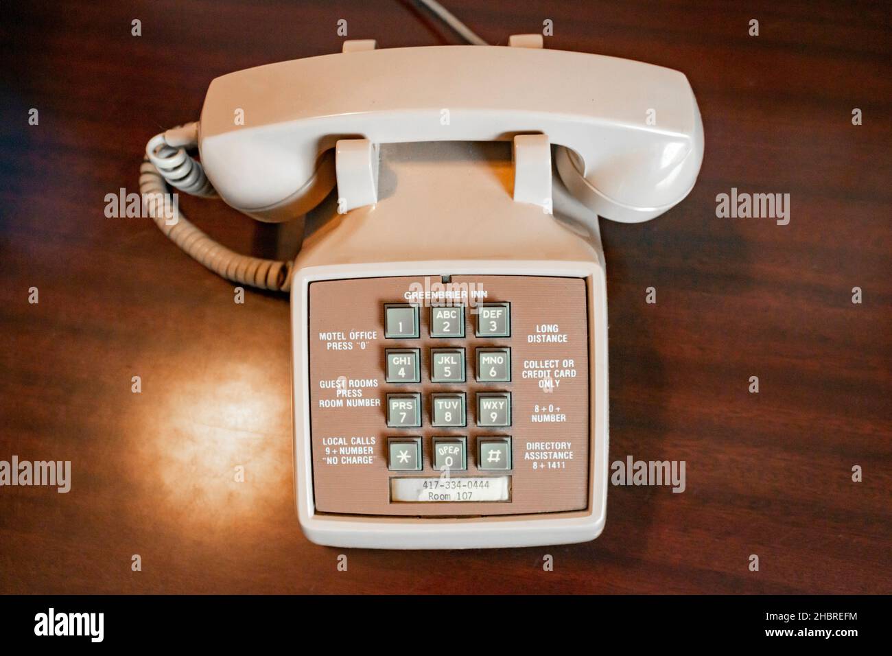 classic old pushbutton telephone handset in greenbrier motel inn Branson missouri Stock Photo