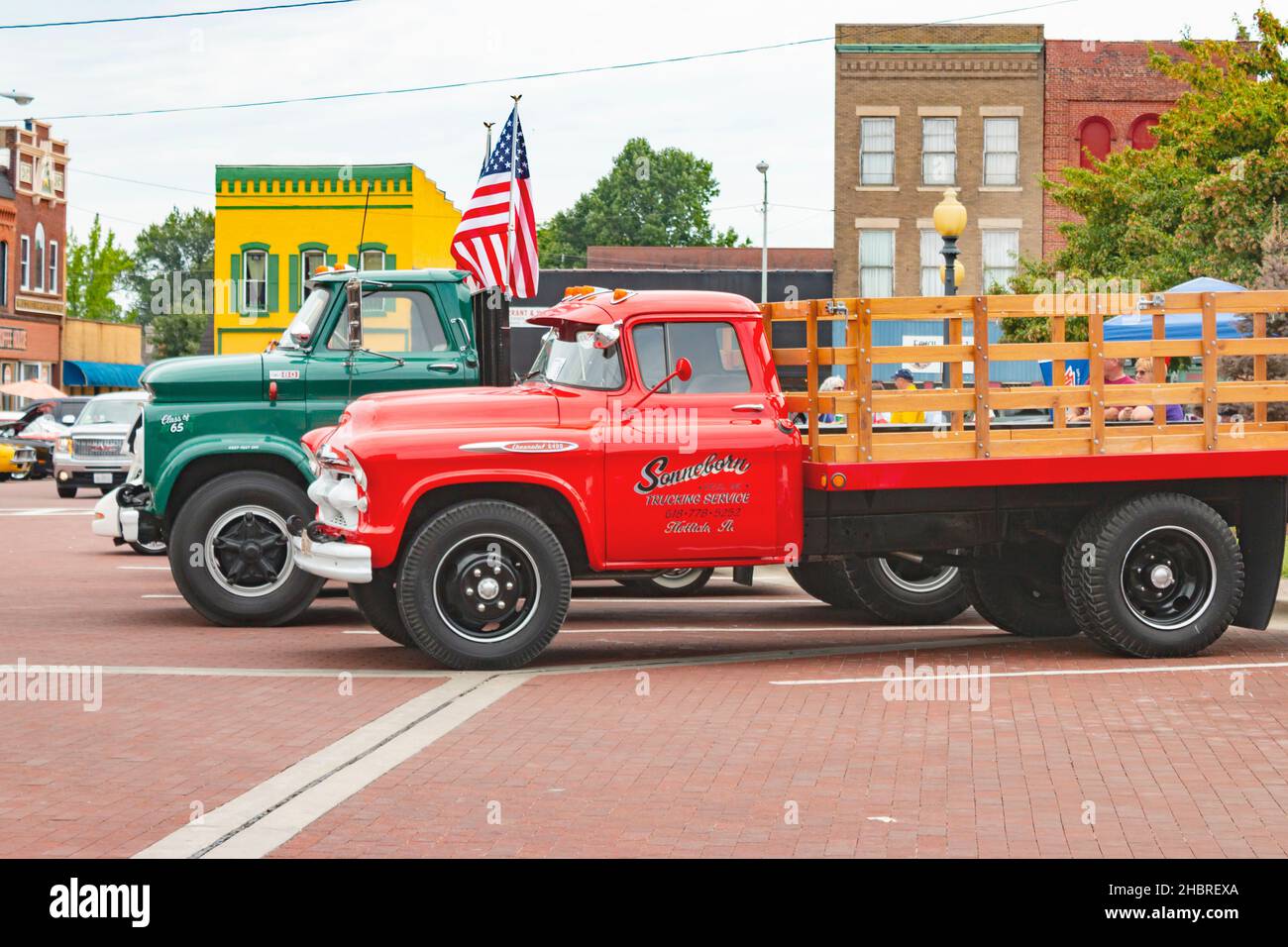 vintage red and green 1940s chevrolet trucks Stock Photo