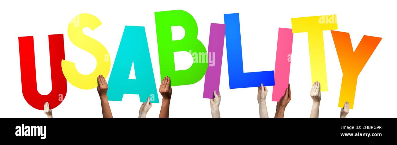 Usability - human hands holding colorful letters Stock Photo