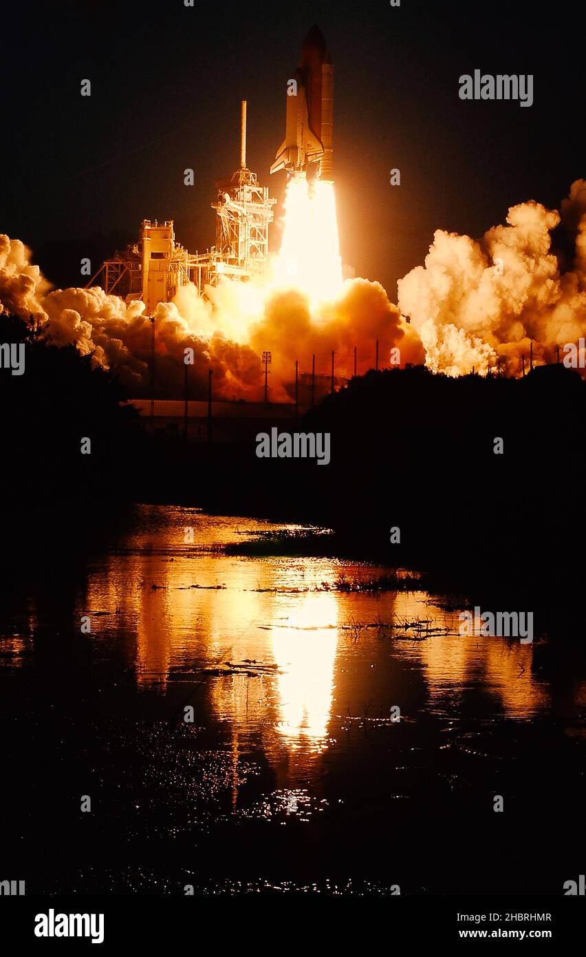 Launch of the spaceship from the spaceport at night. Flight of space shuttle in clouds of smoke. Some elements of this image are furnished by NASA Stock Photo