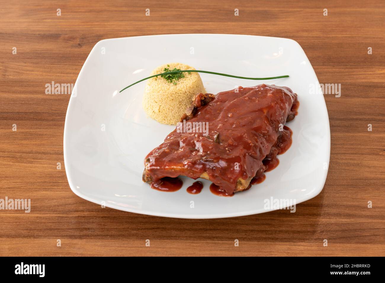 Rice with classic pork ribs with barbecue sauce is a delicious, sticky ...
