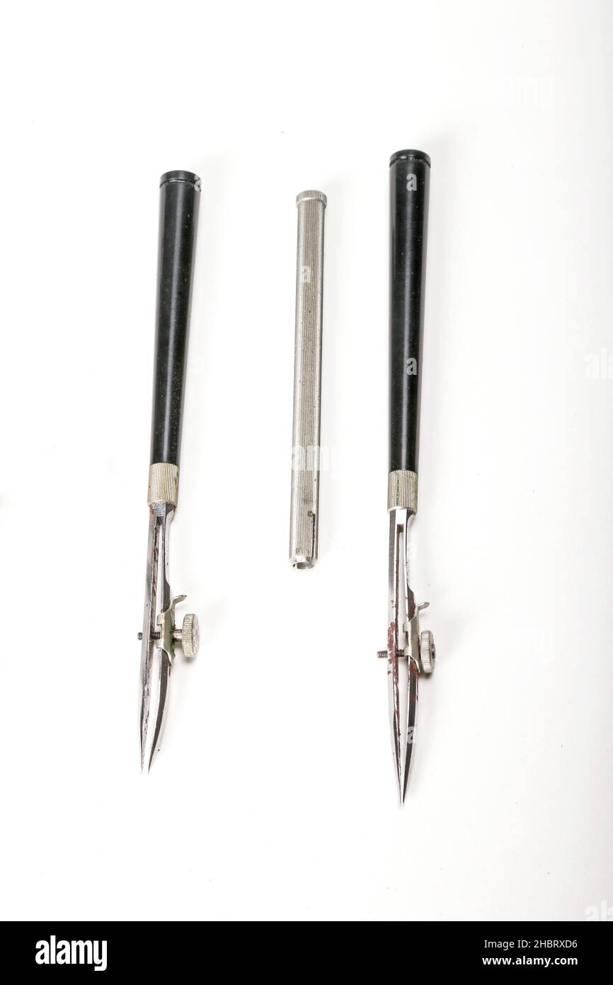 Vintage map drafting tools included these German-made ruling pen, compasses, and miscellaneous small parts - Dietzgen Champion Drawing Instruments Stock Photo
