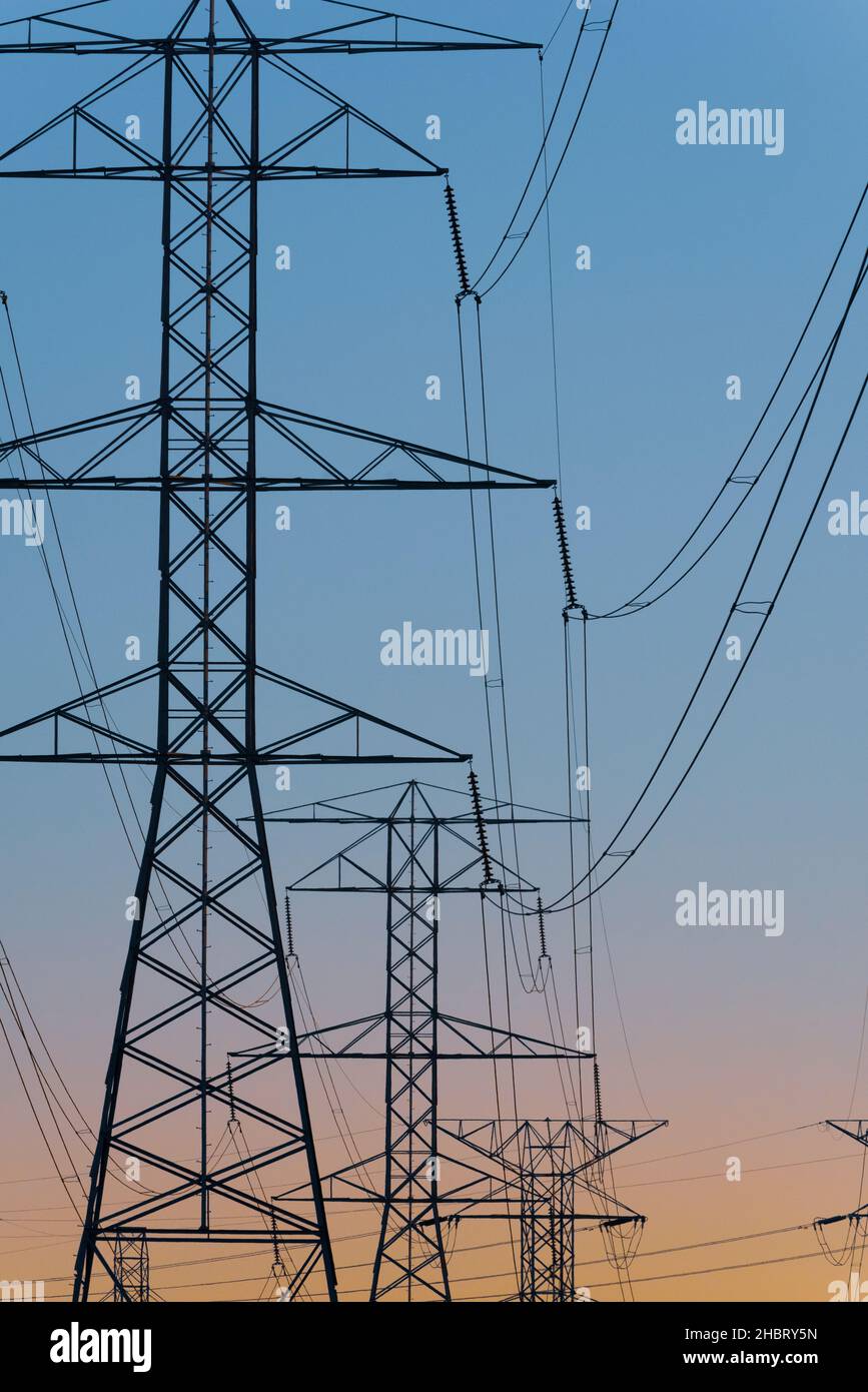 Overhead Electrical Transmission (pylon) lines in Southeast Michigan USA operated by ITC Holdings Corp. providing Midwest grid capacity Stock Photo