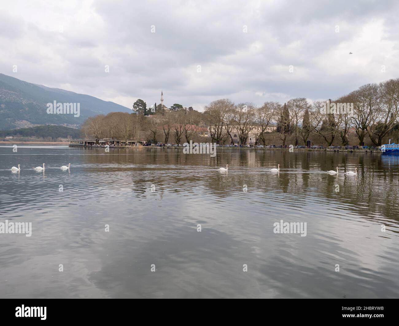 The lake of Ioannina city in Nothern Greece, in the afternoon with clouds Stock Photo