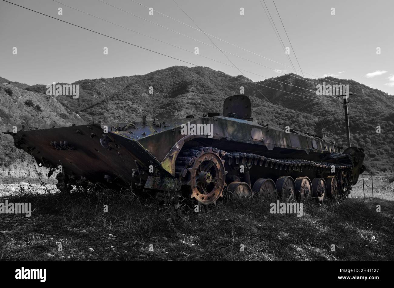 A shot down abandoned rusty soviet infantry armored vehicle (BMP). Stock Photo