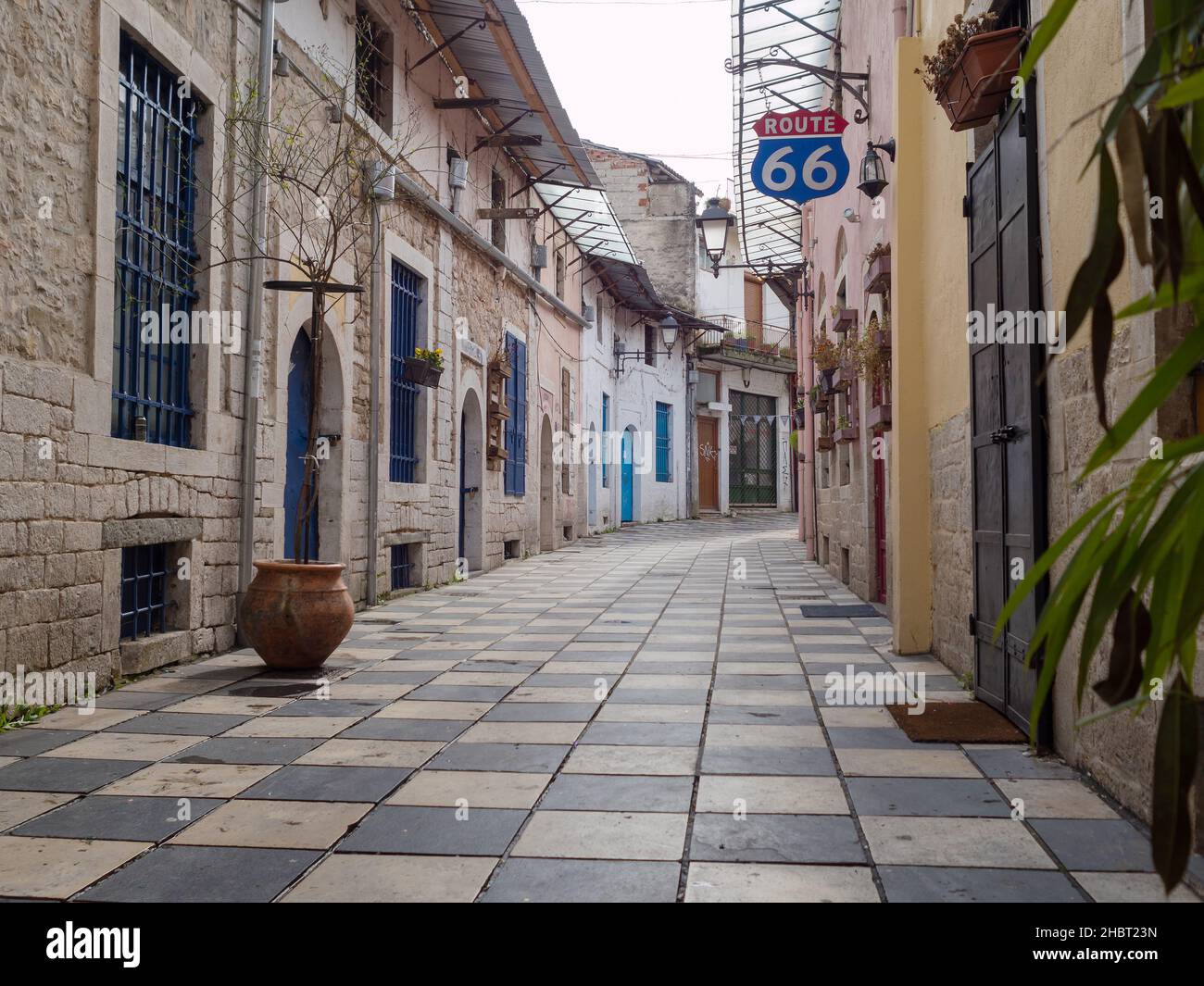 IOANNINA, GREECE - FEBRUARY 19, 2018: Street with shops of Ioannina city in the afternoon, Epirus Greece Stock Photo