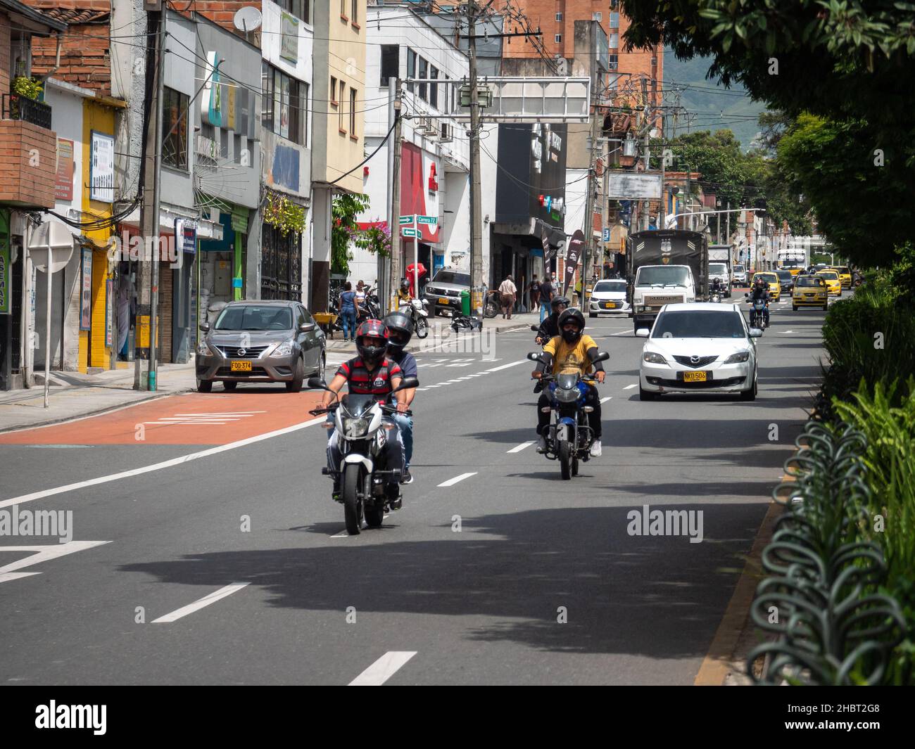Medellin, Colombia July 28 2021 Street with Full Traffic, with Trees