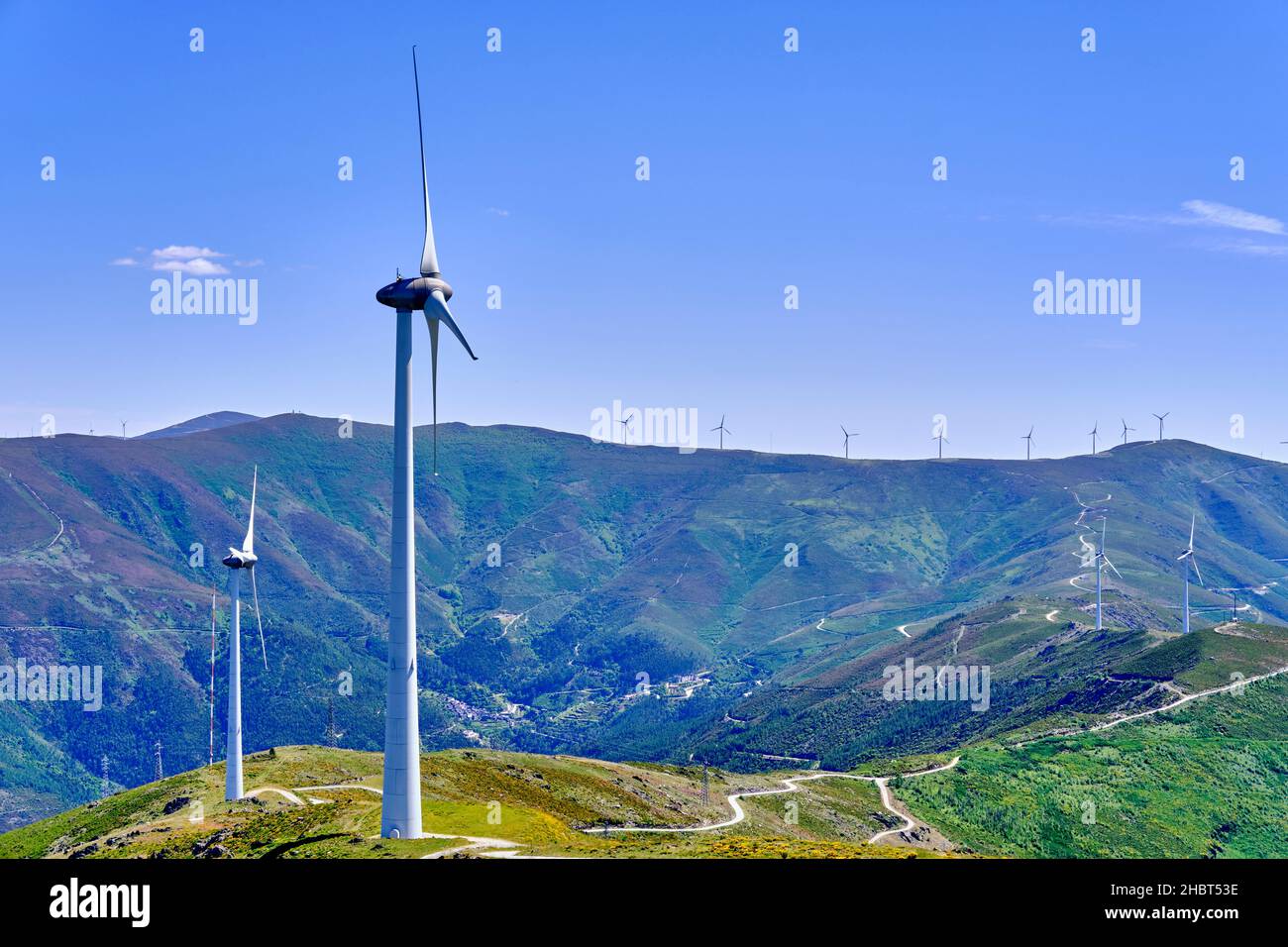 Wind turbines on the summits of serra do Acor mountain range. Piódão, Portugal Stock Photo