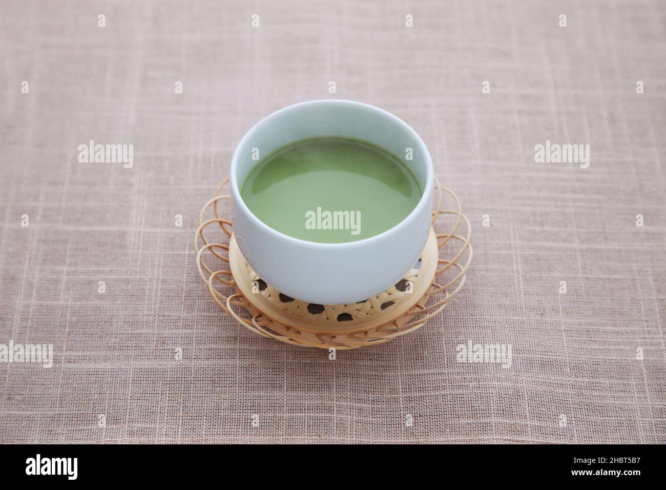 hot green tea with milk matcha latte isolated on table Stock Photo
