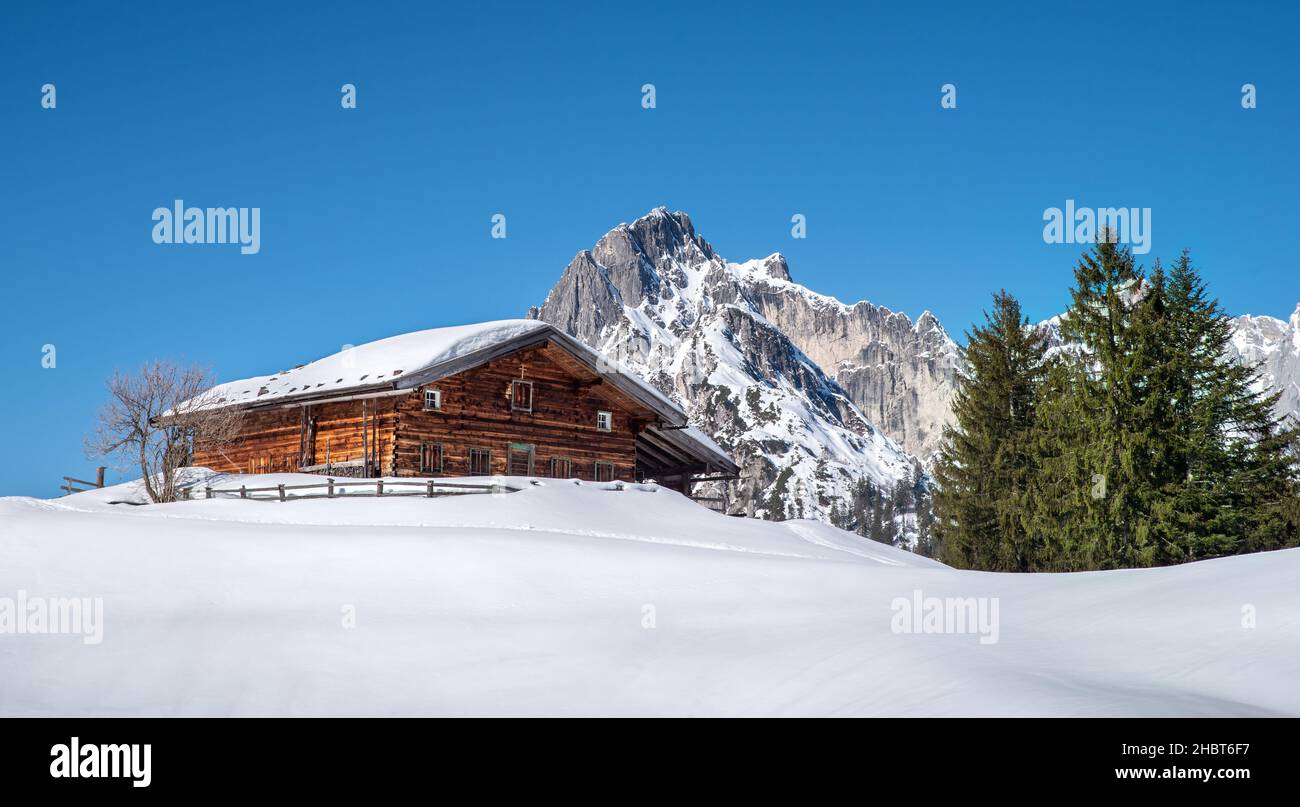 Traditional austrian alpine hut in an idyllic winter landscape, Salzburger  Land, Austria Stock Photo - Alamy