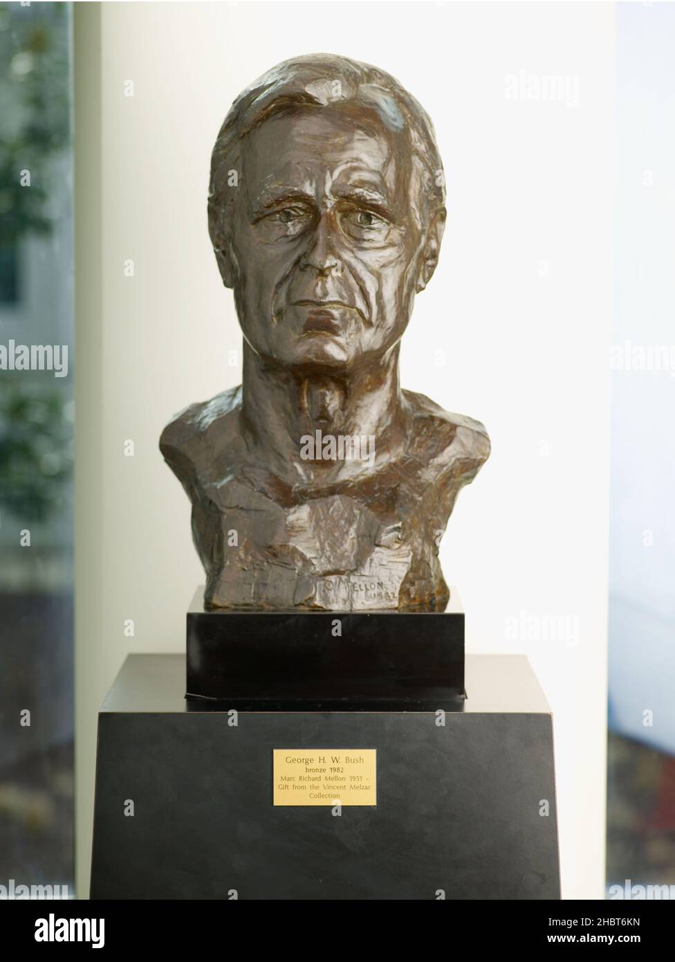 A bust of former Director of Central Intelligence and President George Herbert Walker Bush resides at the top of the steps in the Original Headquarters Building main lobby ca.  8 March 2011 Stock Photo