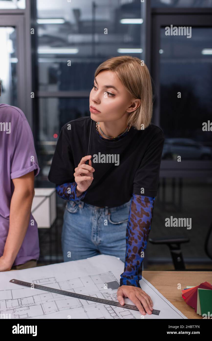 Woman holding up ruler hi-res stock photography and images - Alamy