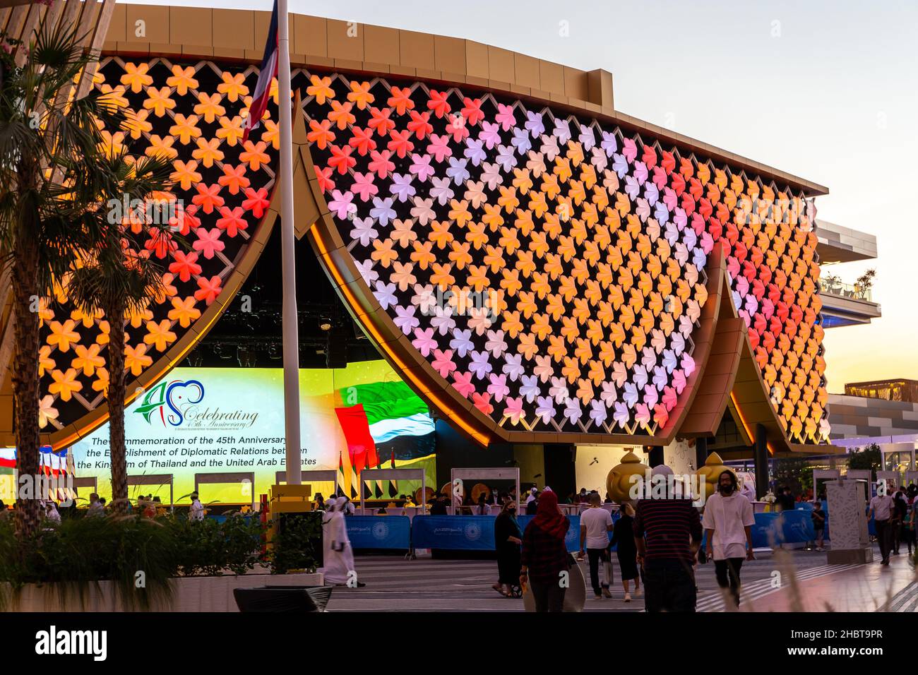 Dubai, UAE, 09.12.2021. Thailand Pavilion at Expo 2020 Dubai with colorful floral pattern illuminated facade. Stock Photo