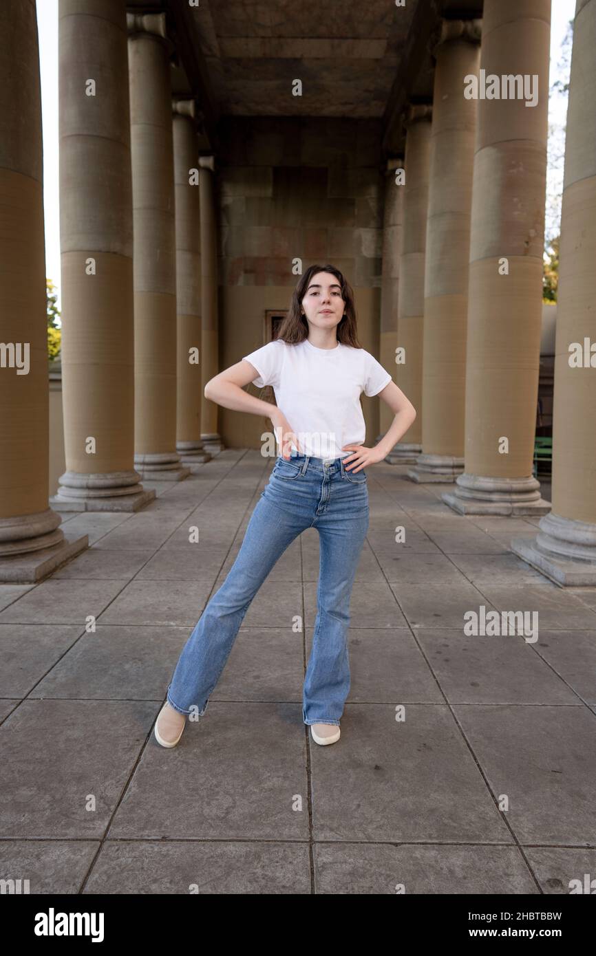 Teenage Woman Doing Jazz Dance Moves in a Loggia Stock Photo