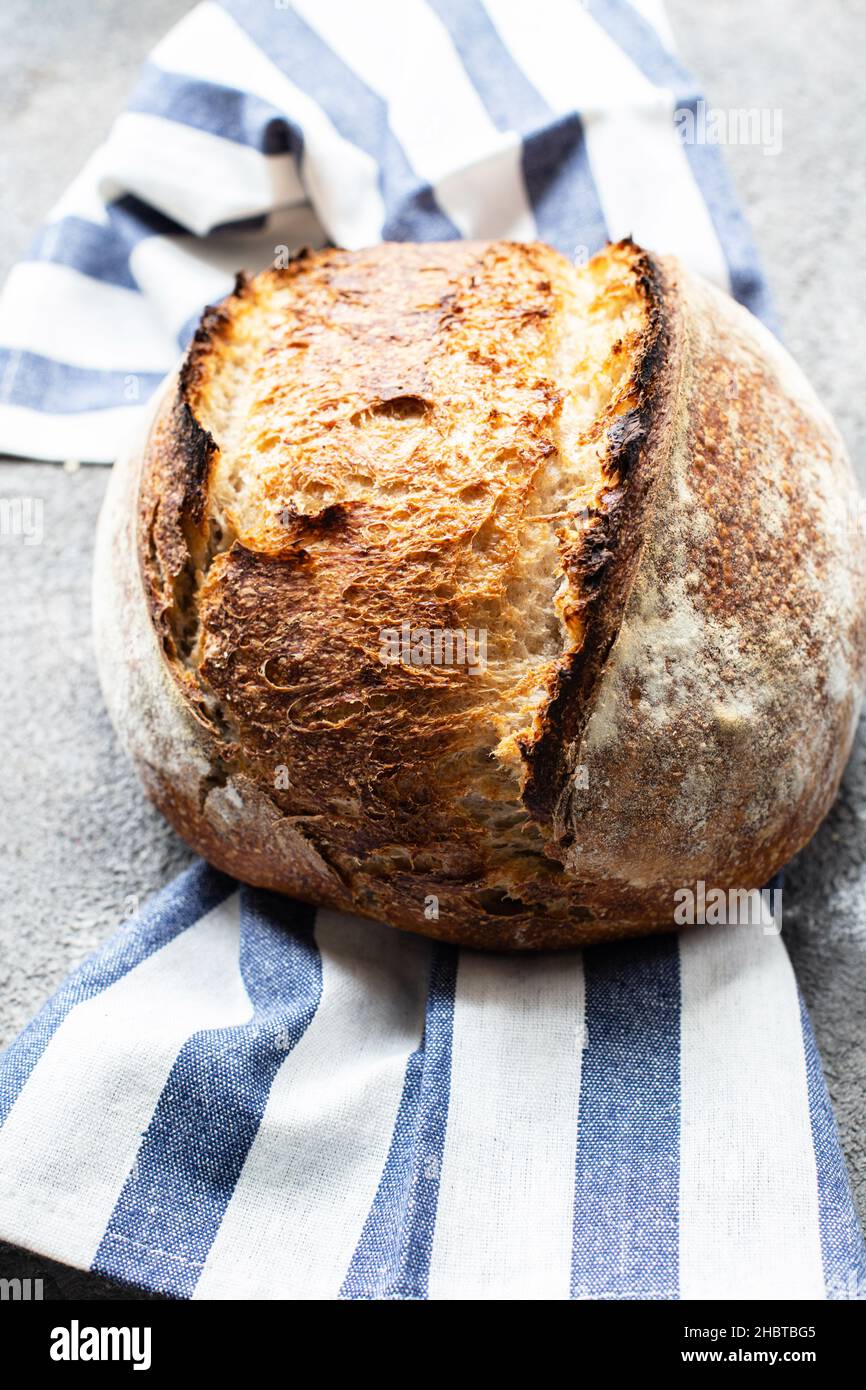 Homemade artisan sourdough whole wheat bread. Healthy bread and organic food. Stock Photo