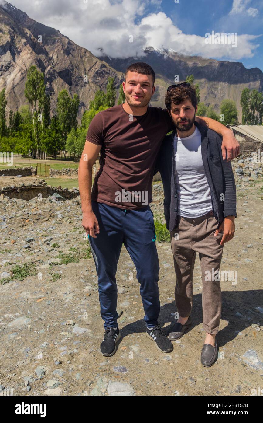 RUSHAN, TAJIKISTAN - MAY 20, 2018: Young men in Rushan town, Tajikistan Stock Photo