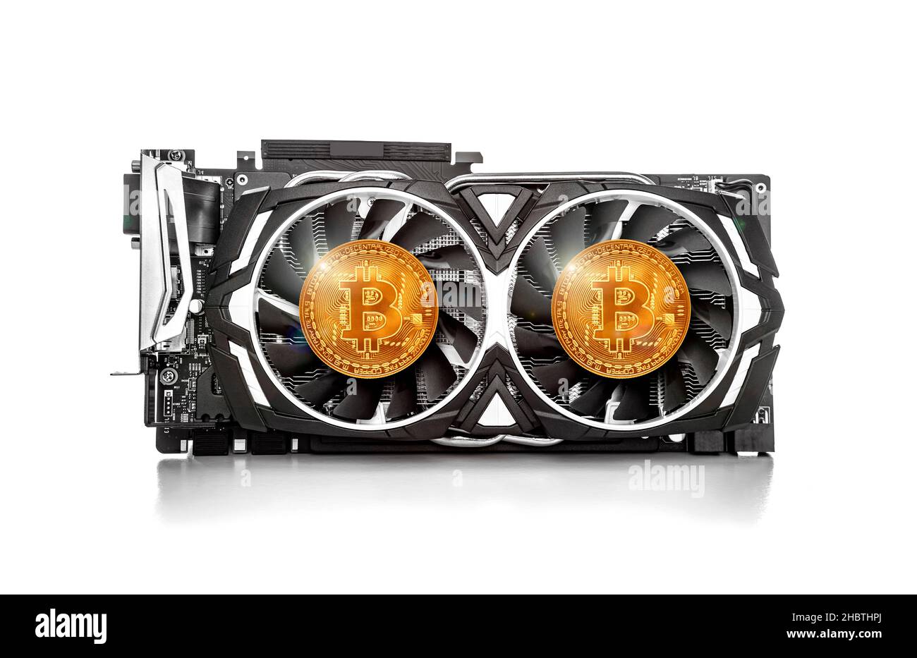Cryptocurrency mining. Bitcoin coin on a graphic card, video card for cryptocurrency mining. Cryptocurrency. Stock Photo