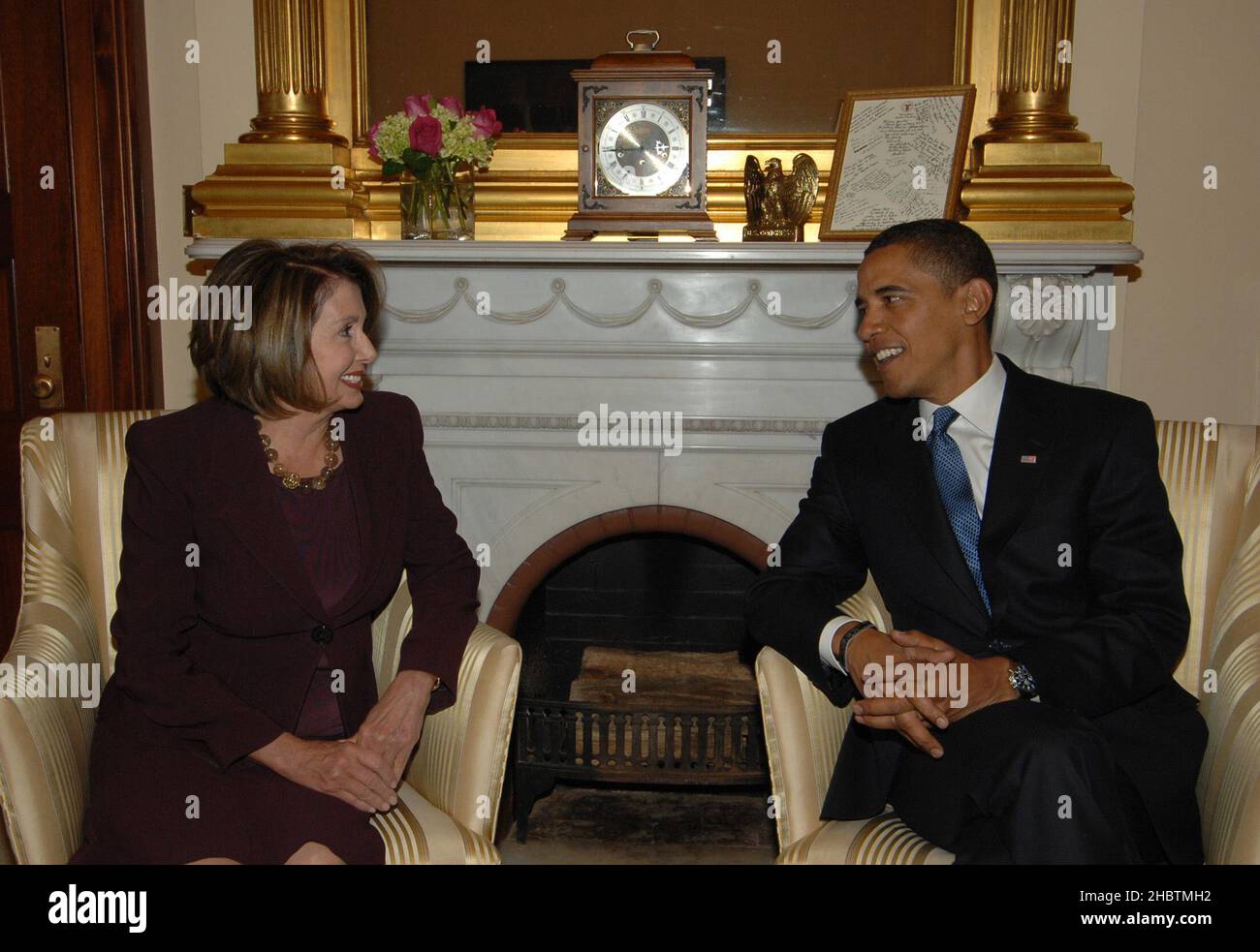 Speaker of the House Nancy Pelosi meeting with President-elect Barack Obama ca.  between 2008 and 2009 Stock Photo