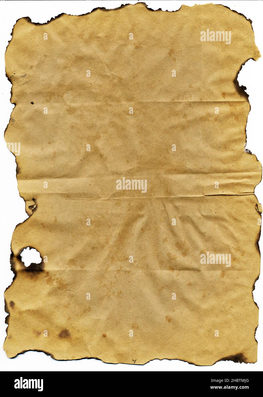 Old paper with burnt edges Stock Photo