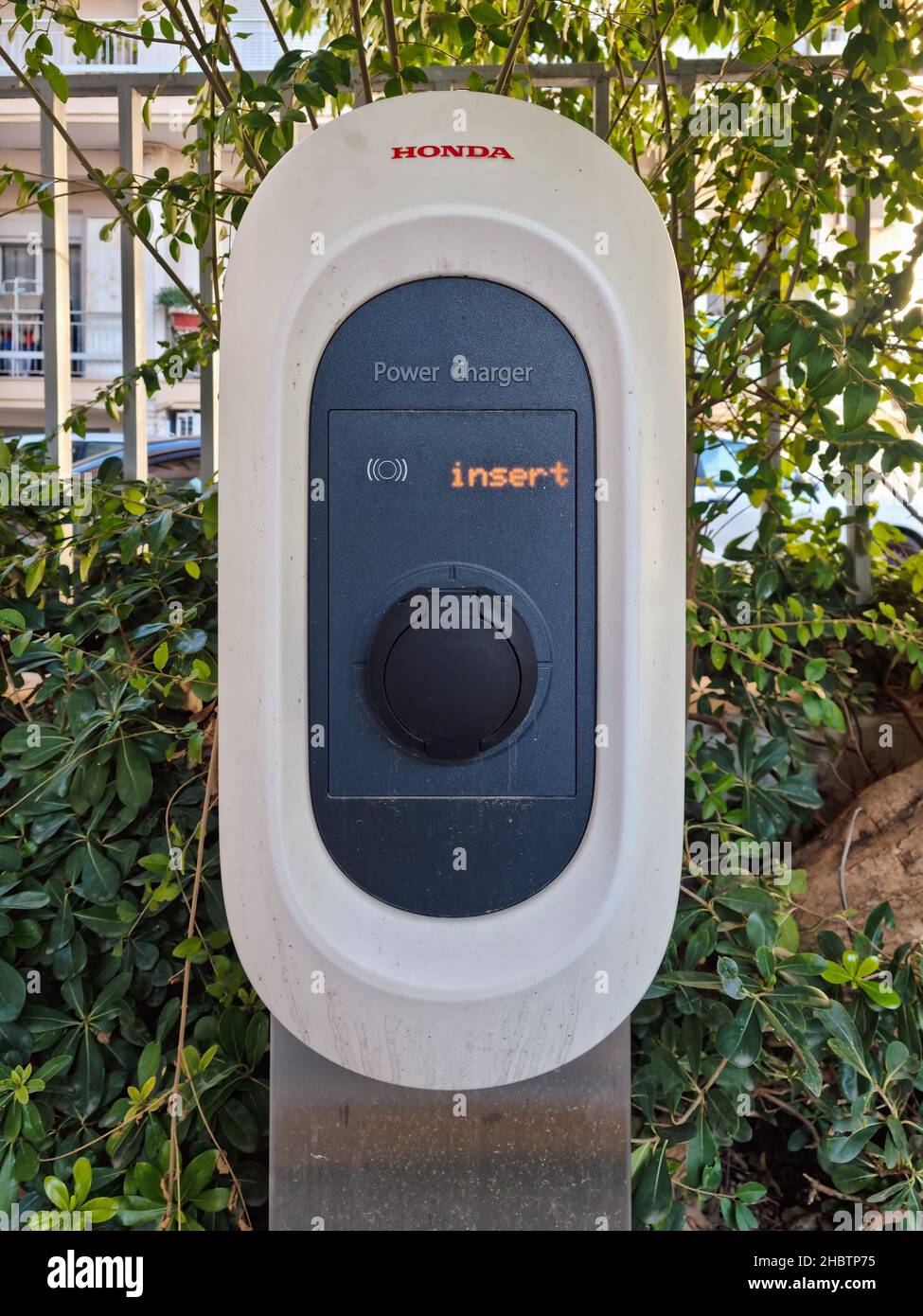 Honda electric car power station with logo. Day view of Power Charger