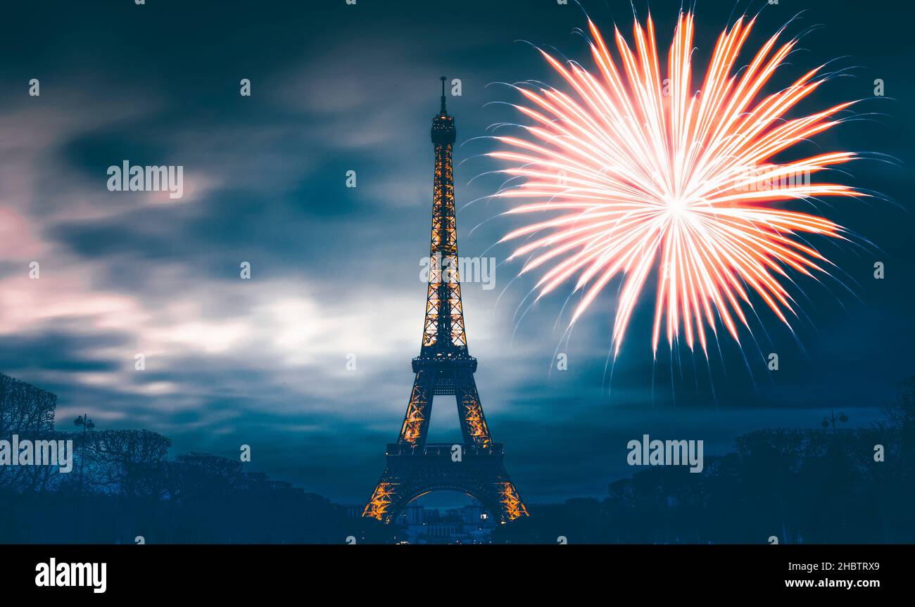 Eiffel tower with fireworks, celebration of the New Year in Paris