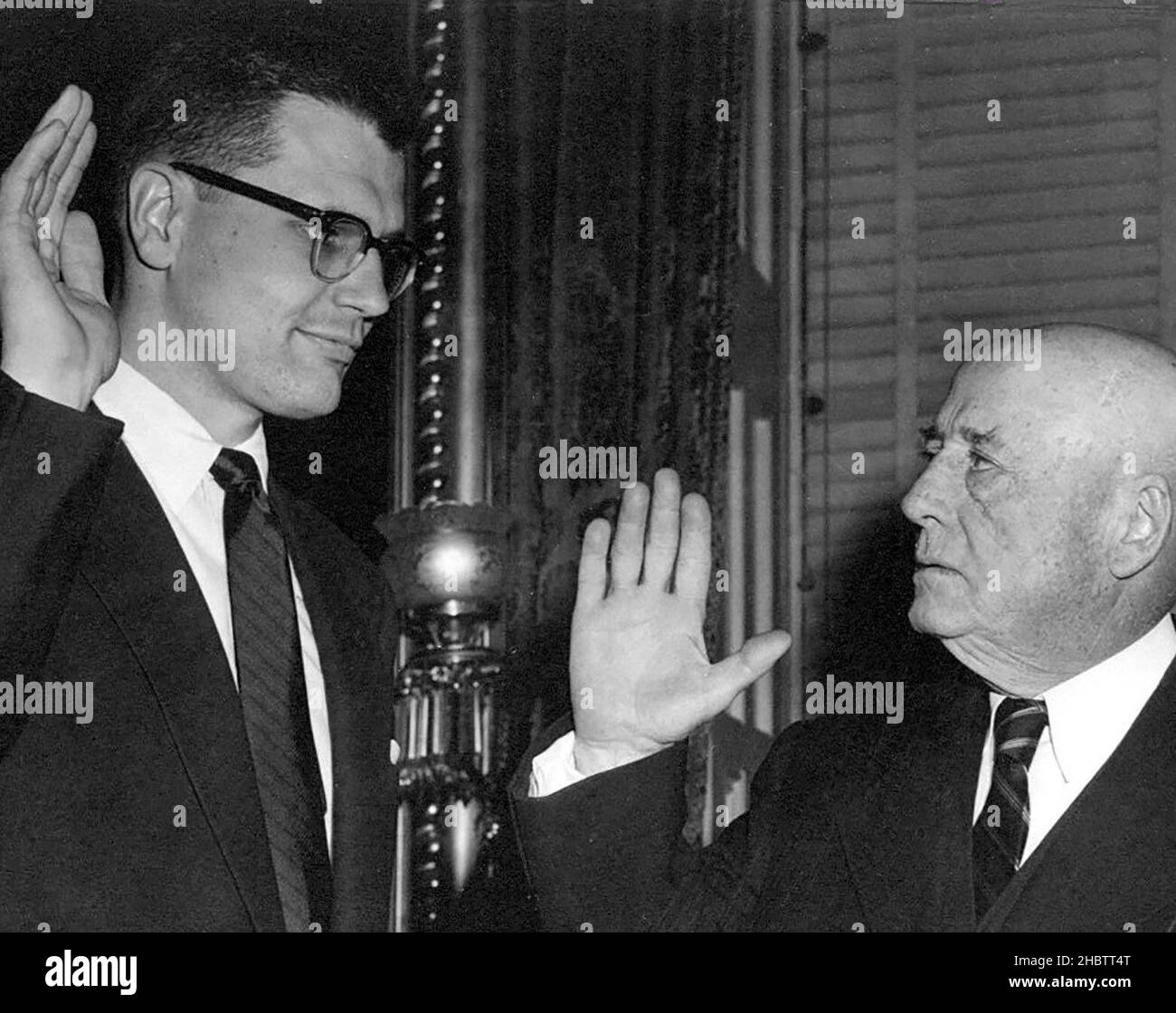 Congressman John D. Dingell being sworn in by Speaker of the House Sam