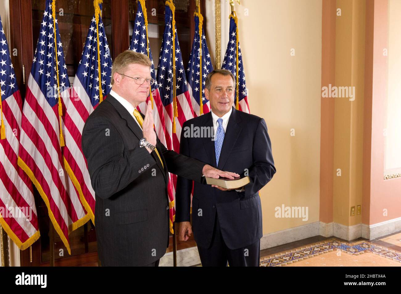 Congressman Mark Amodei (R-NV) being sworn-in by Speaker of the House John Boehner (R-OH) ca.  2011 Stock Photo