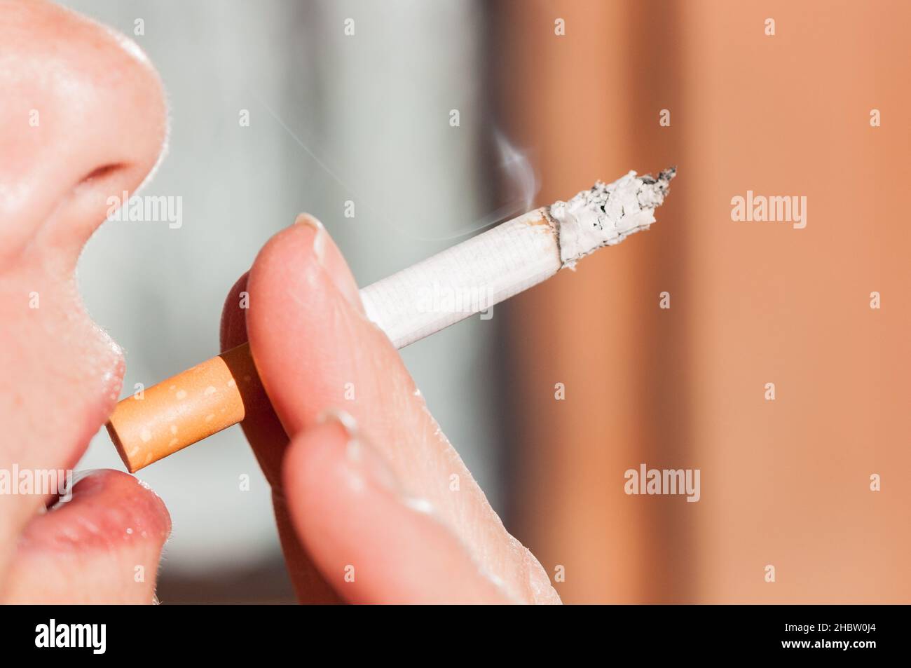 cigarette between lips New anti-smoking laws passed Can Vaping Really Cause Smoker's