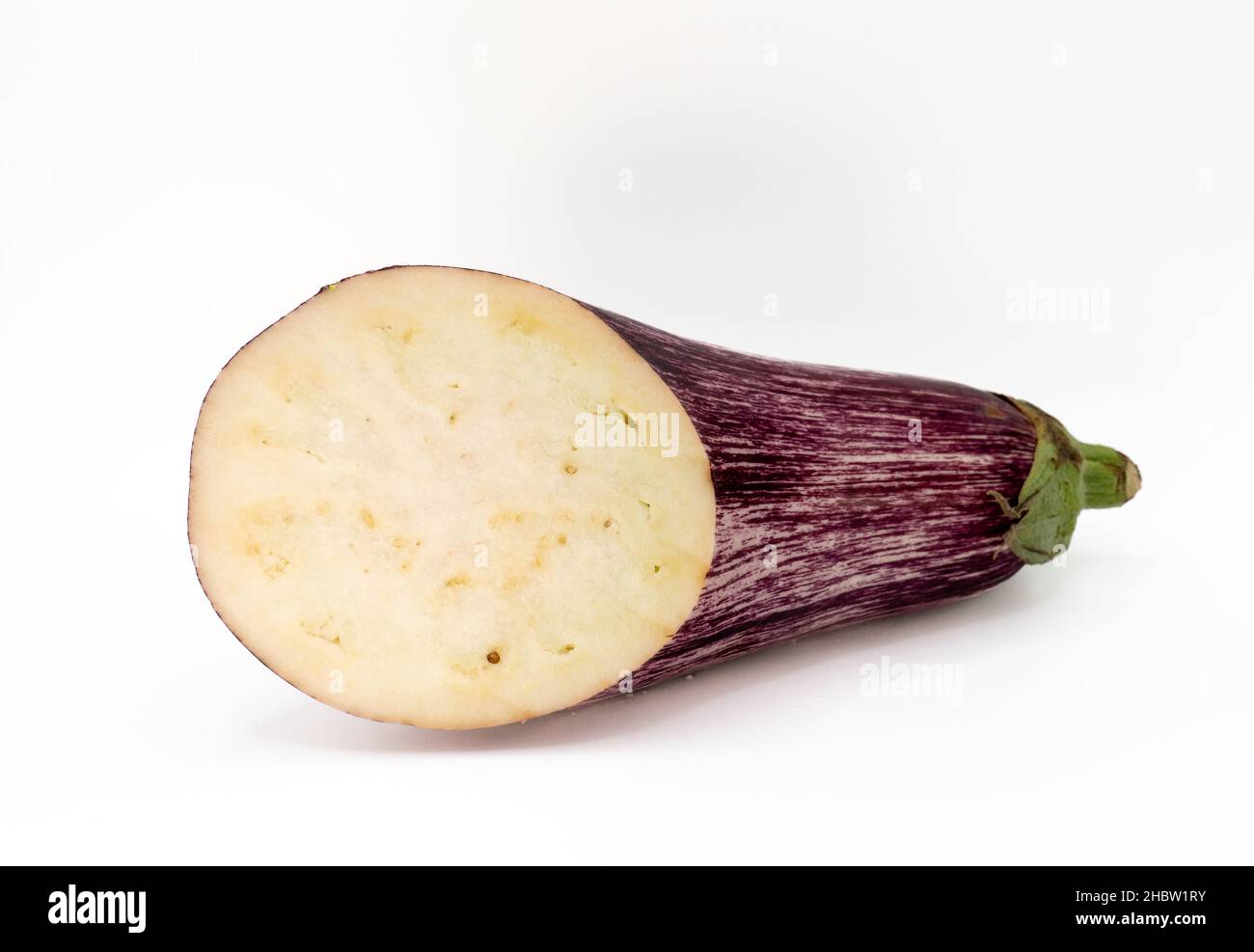 piece of cut veined eggplant isolated on light background Stock Photo