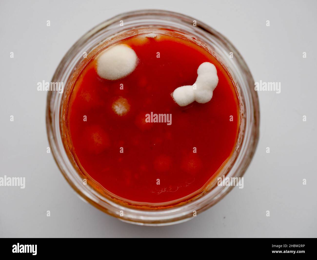 Tomato sauce in glass jar with mold. Aerial view Stock Photo Alamy