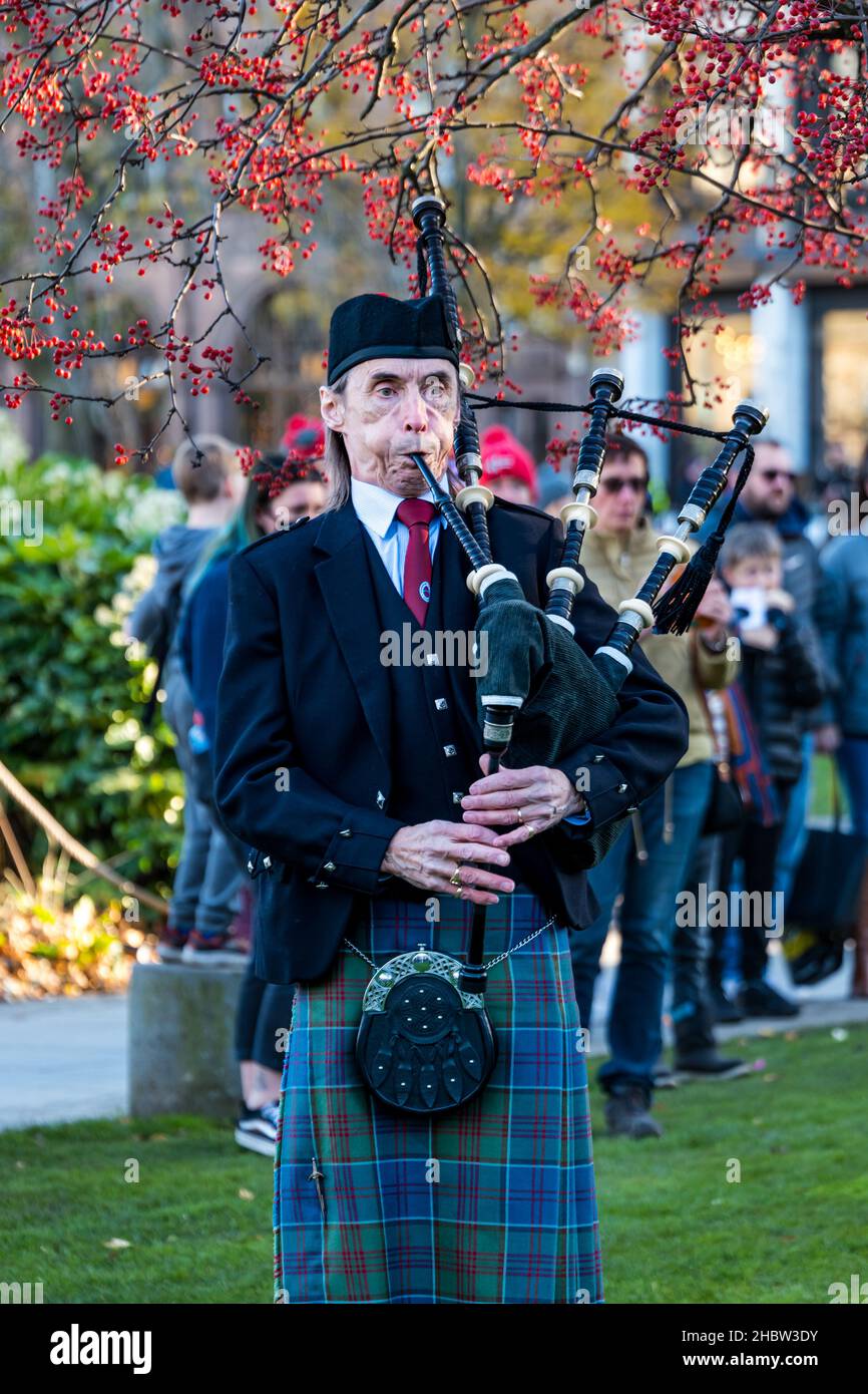 Scottish man wearing a kilt playing bagpipes, Diwali festival event, Edinburgh, Scotland, UK Stock Photo