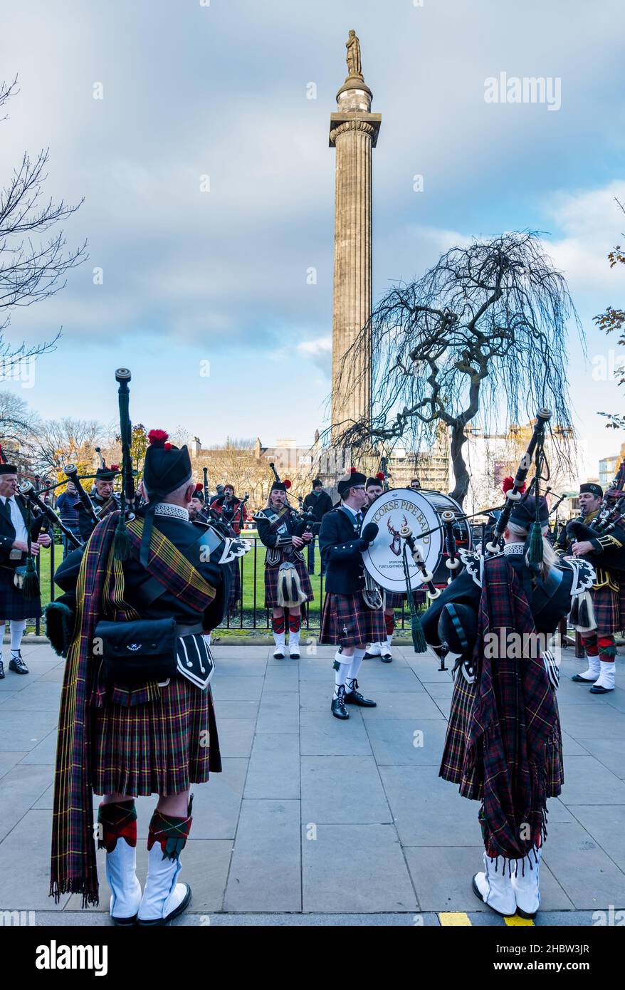 Scottish pipe band wearing kilts playing at Diwali festival event, St Andrew square, Edinburgh, Scotland, UK Stock Photo