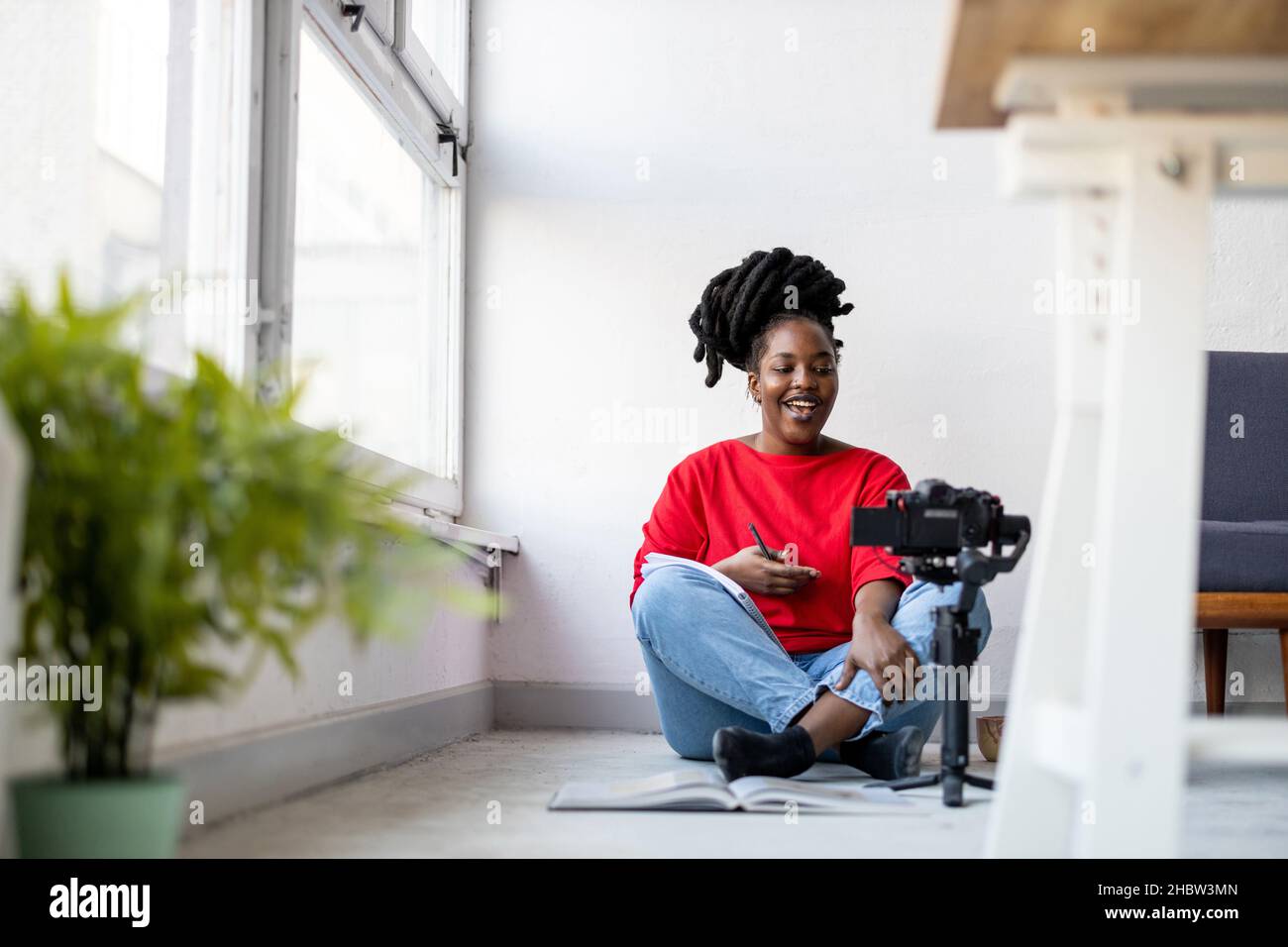 Female vlogger making social media video Stock Photo