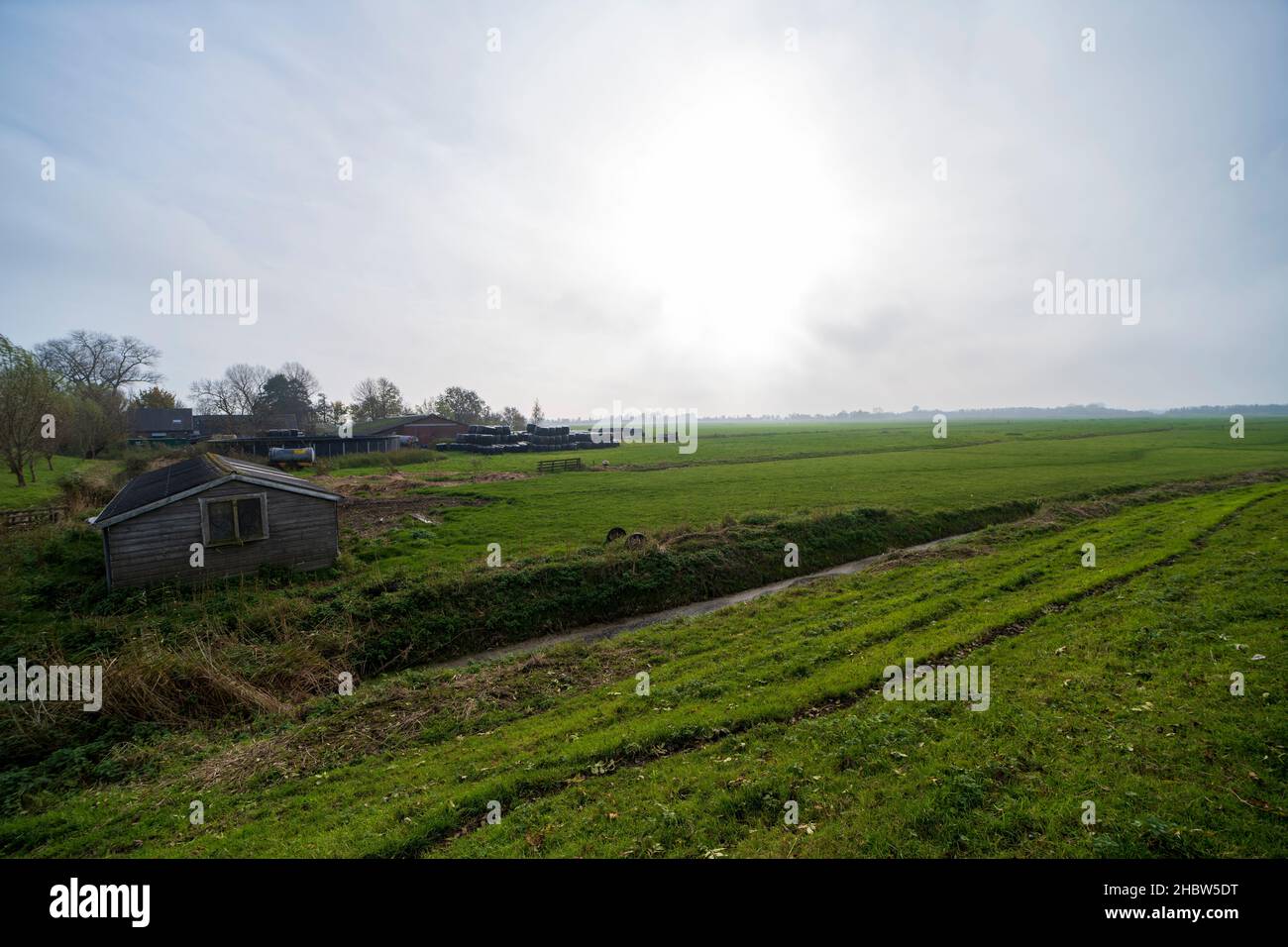 Countryside landscape with farm buildings in autumn Stock Photo