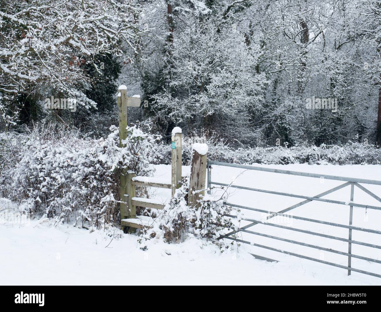 Wooden stile in Worcestershire countryside in winter. Stock Photo