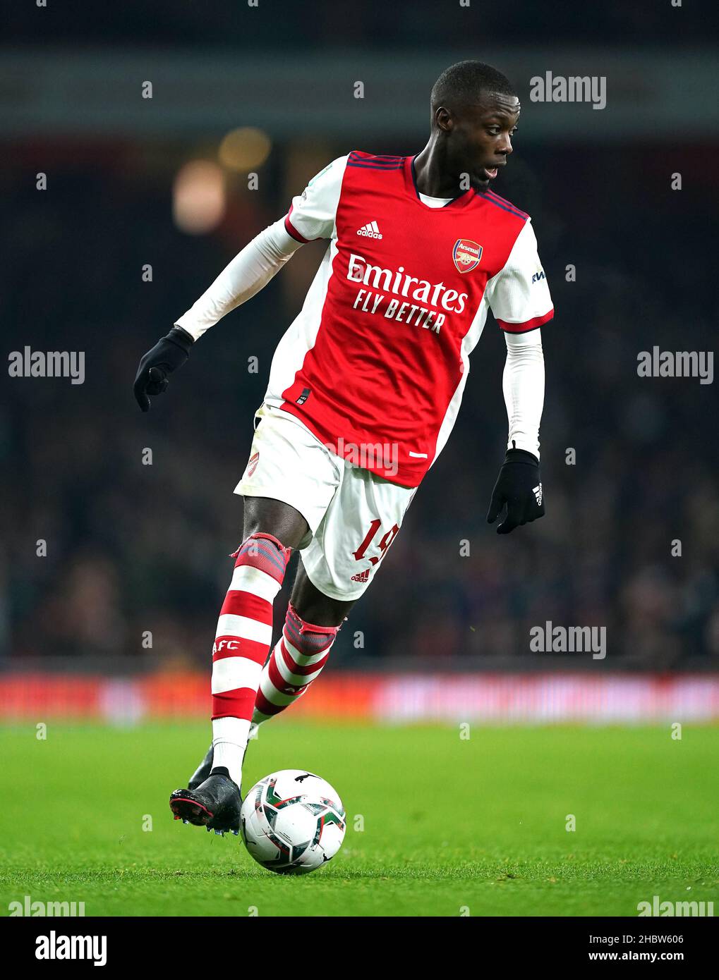 Arsenal's Nicolas Pepe in action during the Carabao Cup quarter final match  at the Emirates Stadium, London. Picture date: Tuesday December 21, 2021  Stock Photo - Alamy