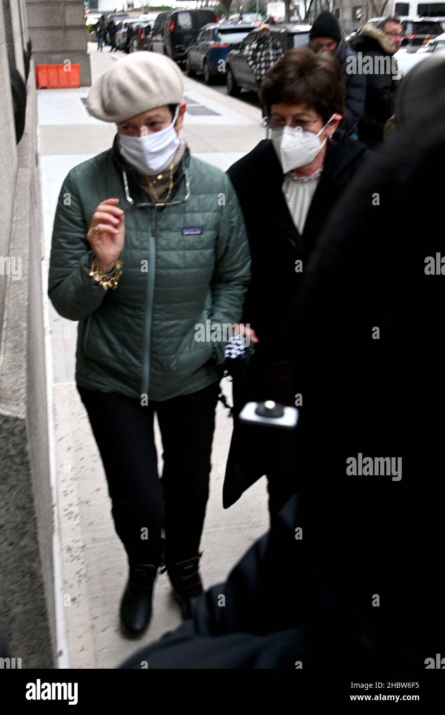 New York, USA. 21st Dec, 2021. Isabel Maxwell (white hat) and Christine Maxwell, Ghislaine Maxwell twin sisters, are seen arriving at the federal courthouse in the Southern District of New York for the trial of Ghislaine Maxwell, New York, NY, December 21, 2021. A jury has begun its deliberations over whether the British socialite is a dangerous predator who recruited teenagers to be sexually abused by financier Jeffrey Epstein, as prosecutors claim. (Photo by Anthony Behar/Sipa USA) Credit: Sipa USA/Alamy Live News Stock Photo
